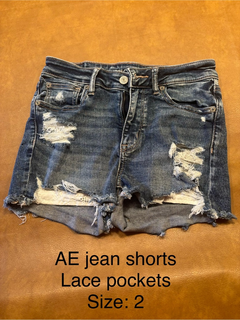 American Eagle Outfitters Distressed Lace-Pocket Denim Shorts — Blue